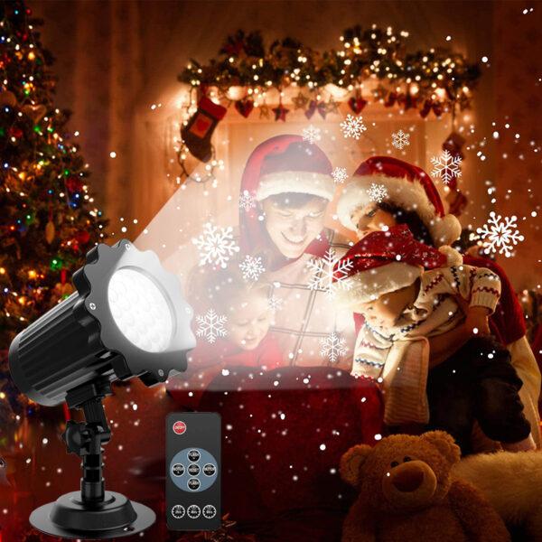 Indoor snowflake projection light promotional picture, black snow projector with remote control, floating white snowflake patterns overlay warm Christmas family scene with Xmas tree and festive wreath, home holiday decoration advertising image