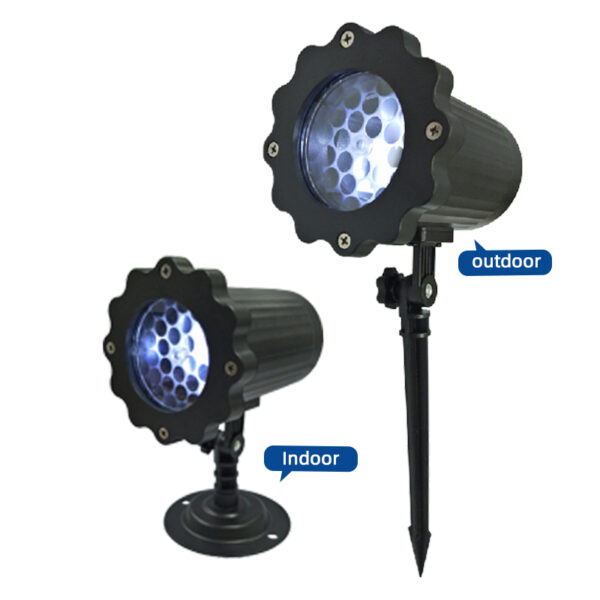 Christmas snowflake projection light dual version comparison picture, indoor model equipped with round wall mount base, outdoor model matched with long ground spike stake, labeled "Indoor" and "outdoor", matte black lamp housing with flower-shaped front cover, white background holiday decorative projector product shot
