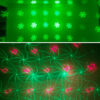 Two projection effects of Christmas laser light, top full green snowflake pattern, bottom red bell with green swirl dynamic laser pattern